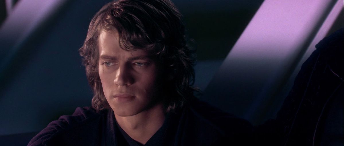 Hayden Christensen as Anakin Skywalker stares off into the distance