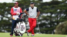 Source -- Patrick Reed's caddie punches fan at Presidents Cup