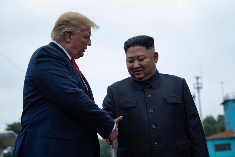 President Donald Trump and North Korea's leader Kim Jong-un shake hands before a meeting in the Demilitarized Zone (DMZ) on June 30, 2019. 