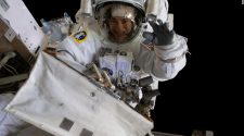 Second all-female space walk briefly hampered by helmet issue