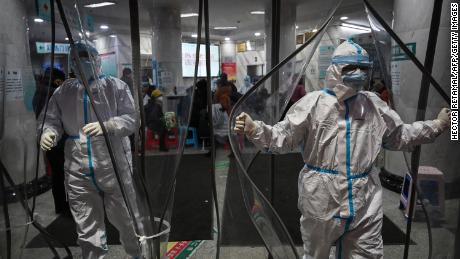 &#39;We&#39;ll admit them if they&#39;re dying&#39;: Virus outbreak pushes China&#39;s stretched health care workers to breaking point