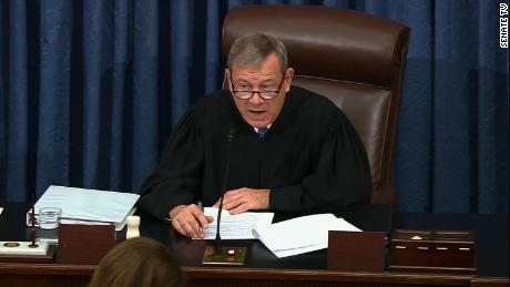 John Roberts watches as senators debate whether he can intervene in the impeachment trial