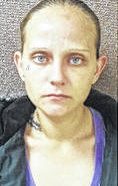 Maxton woman charged with break-in