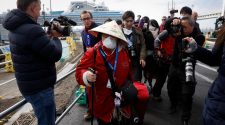 Coronavirus Live Updates: Passengers Begin Departing Quarantined Cruise Ship in Japan