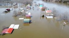 'Historic' flooding swamps southern USA