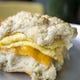 Biscuit Head serves up a biscuit sandwich with cheese and egg.