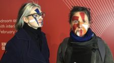 With painted faces, artists fight facial recognition tech