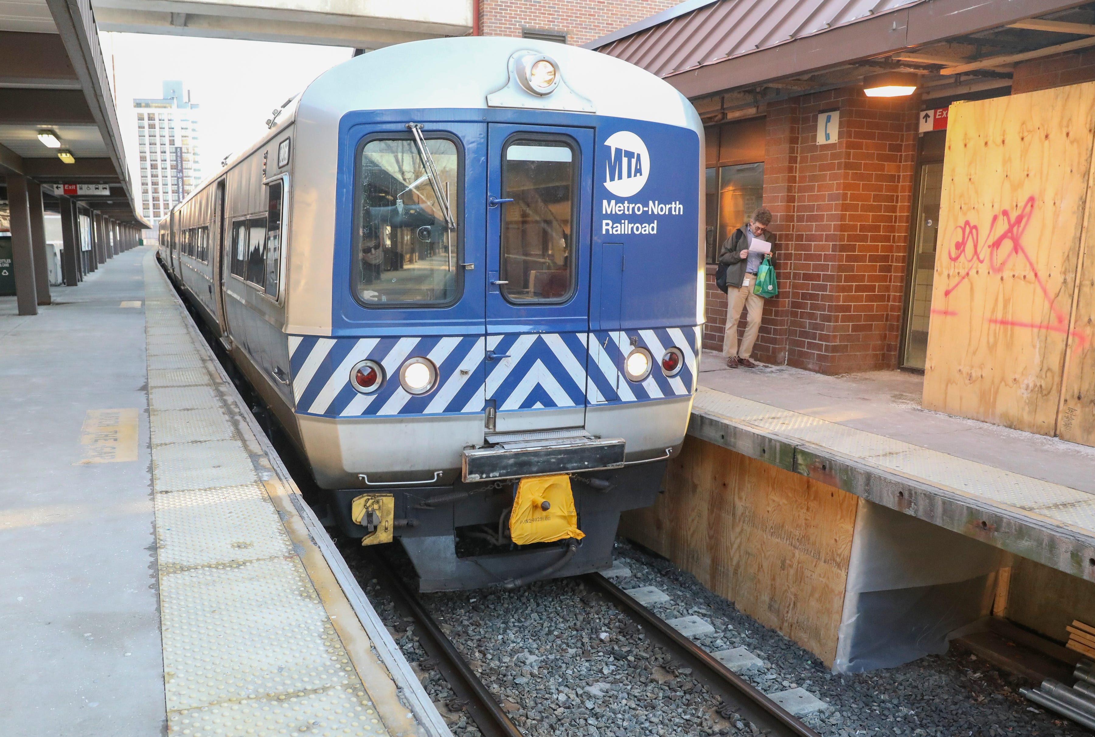 A MTA/Metro-North Railroad engineer drives a commuter train in to the  White Plains Metro-North Train Station on Monday, March 11, 2019.