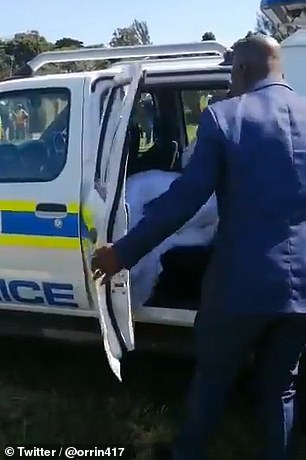 Footage of the arrest shows the bride being forced into the back of a police car wearing her wedding dress in KwaZulu Natal province