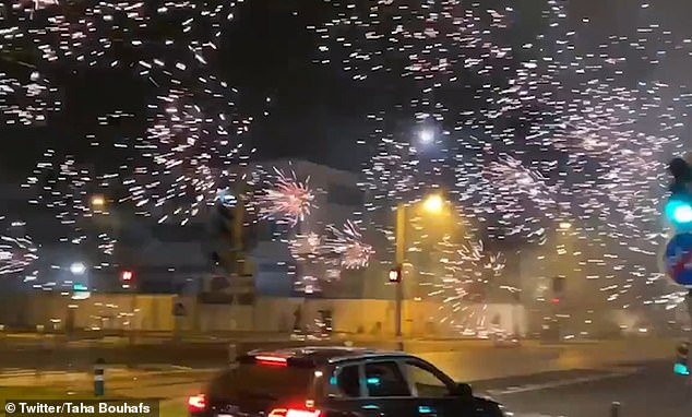 Protesters fired fireworks at buildings and into police officers in early hours of this morning