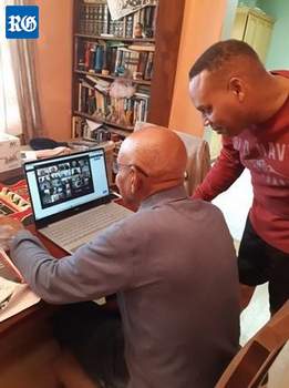 Ray Simons, seated, and son Owen were part of a virtual reunion of members of The Warrenaires, a once popular gospel group (Photograph supplied)