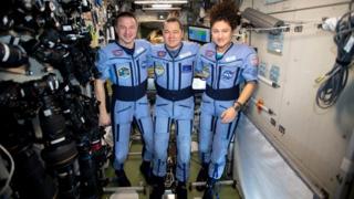 The trio on board the International Space Station (ISS)