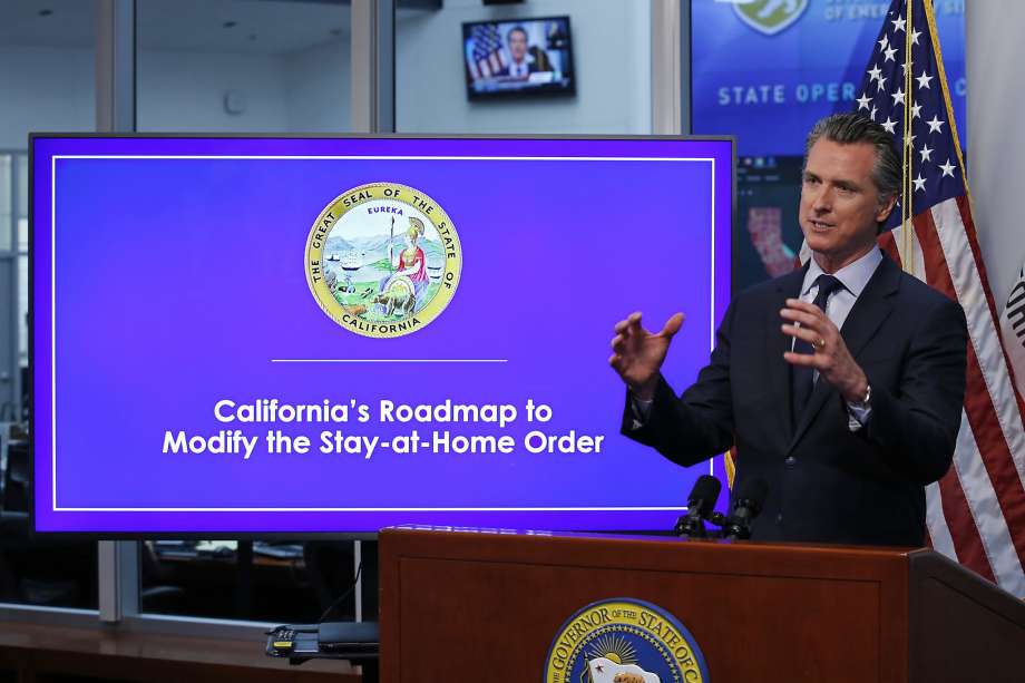 FILE - In this April 14, 2020, file photo, California Gov. Gavin Newsom gestures during a news conference at the Governor's Office of Emergency Services in Rancho Cordova, Calif. On Wednesday, April 22, Gov. Newsom is scheduled to give an update on the six indicators state officials are watching to determine when they might loosen the state's stay-at-home order to prevent the spread of the coronavirus. (AP Photo/Rich Pedroncelli, Pool, File) Photo: Rich Pedroncelli / Associated Press
