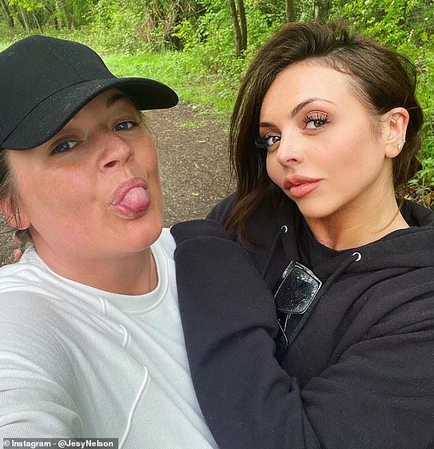 Natural: Jesy Nelson embraced her natural beauty when she took a break from isolation and went makeup free for a walk on Tuesday