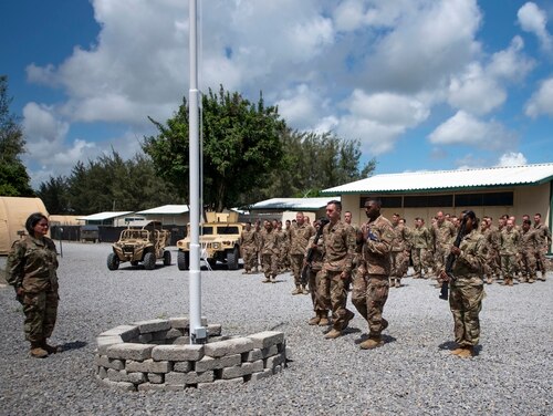 A flag-raising ceremony is held Aug. 26, 2019, at Camp Simba, Manda Bay, Kenya. (Staff Sgt. Lexie West/U.S. Air Force via AP)