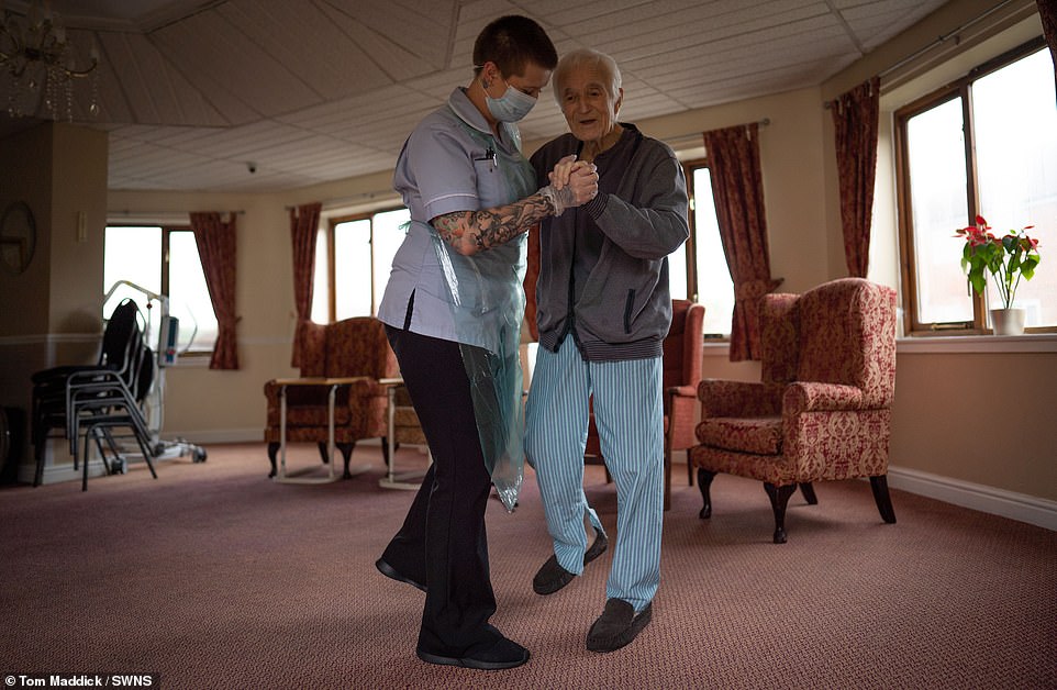 Pictured: 79-year-old Jack Dodsley dancing with a health worker at Newfield Nursing Home in Sheffield
