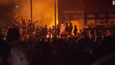 State police arrive at deserted police precinct set ablaze by crowds protesting George Floyd&#39;s death 