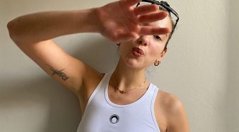 Keeping it simple: Dua Lipa, 24, posed braless in a tight white tank top, for naturally-lit photographs shared to Instagram on Friday