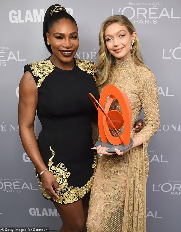 Overdoing it? Gigi Hadid accidentally pulled something in her arm while 'training' for a video game tennis tournament she's set to play with pal Serena Williams. They're seen in 2017 together above