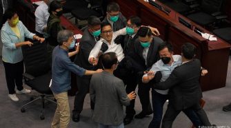 Hong Kong: Fights break out in legislature over anthem bill | News | DW