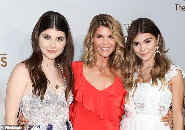 Plea deal: The Full House star, pictured with Olivia and Bella in 2017, is expected to serve two months in prison and complete 100 hours of community service when sentenced in August