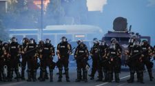 Why do American police have such powerful weapons for breaking up protests?