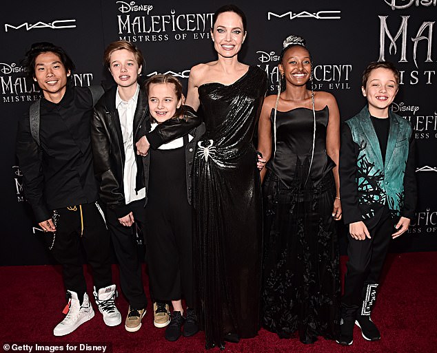 Busy mom: Before giving birth to her three youngest children Shiloh, 12, and twins Knox and Vivienne, 11, Jolie became a mom to Maddox, 18, Pax, 16 and Zahara, 15, through adoption; pictured in 2019