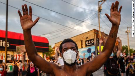 As a pandemic and protests over George Floyd&#39;s death collide, officials stress: Wear a mask