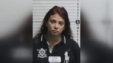 Woman charged with breaking and entering