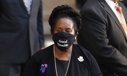 The Texas congresswoman Sheila Jackson wears a ‘Good Trouble’ face mask in the Rotunda of the US Capitol.