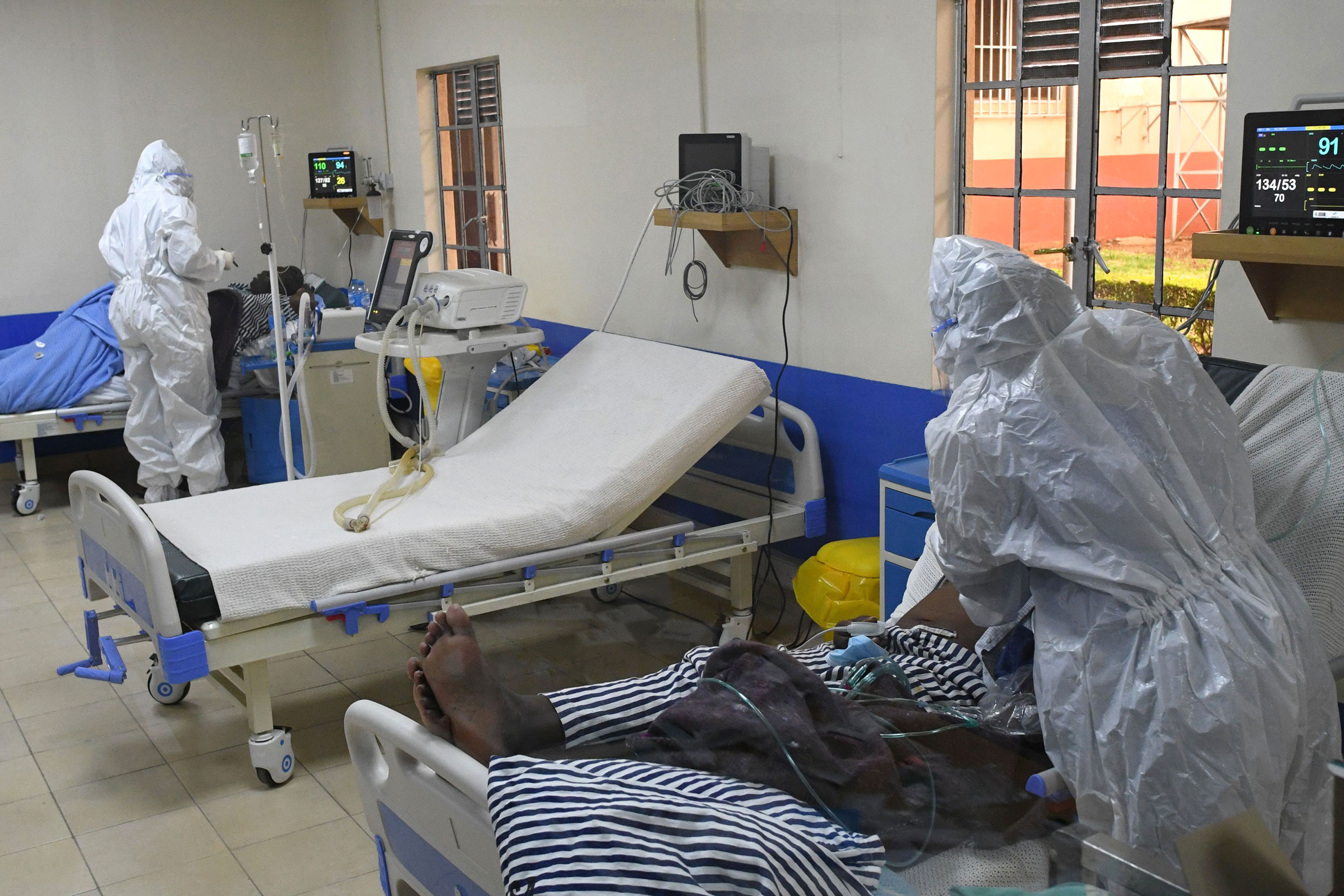 Members of the medical staff tend to coronavirus patients at the Intensive Care Unit of the Machakos County Level-5 hospital in Machakos, Kenya, on July 28.