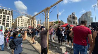 Demonstrators erect mock gallows in Beirut as thousands join 'judgment day' protests