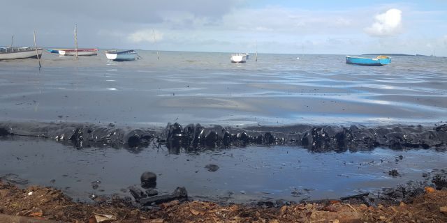 Oil is seen polluting the shores of the public beach in Riviere des Creoles, Mauritius, on Saturday. (Sophie Seneque via AP)