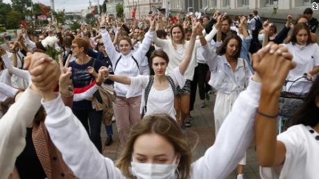 About 200 women march in solidarity with protesters injured in the latest rallies against the results of the country&#39;s presidential election in Minsk on Wednesday.
