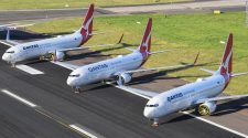 Australia's Qantas says international flights "unlikely" to resume before July 2021 as company posts 91% drop in profit