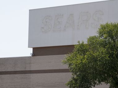 The outline of SEARS can be seen on the exterior of RedBird Mall in southern Dallas. UT Southwestern will lease 150,000 square feet to create a major medical center and bring much-needed health services to that part of the city.
