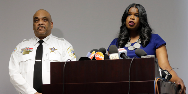 FILE - In this Feb. 22, 2019, file photo, Cook County State's Attorney Kim Foxx, right, speaks at a news conference as Chicago Police Superintendent Eddie Johnson listens in Chicago. (AP Photo/Kiichiro Sato, File)