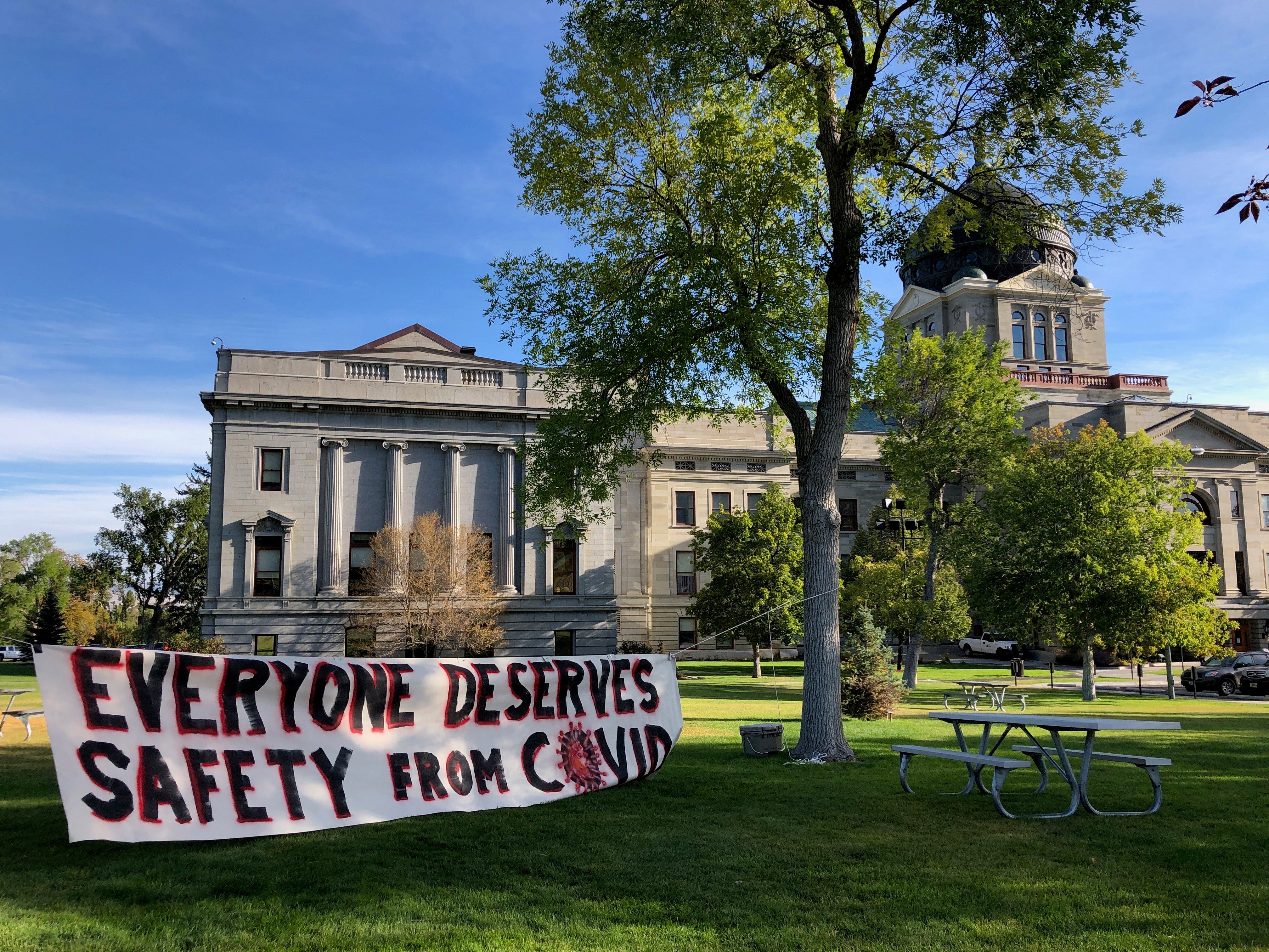 Above is a sign part of the #LetThemComeHome protest Thursday on the lawn of the state Capitol. The signs were by people from all over the state.