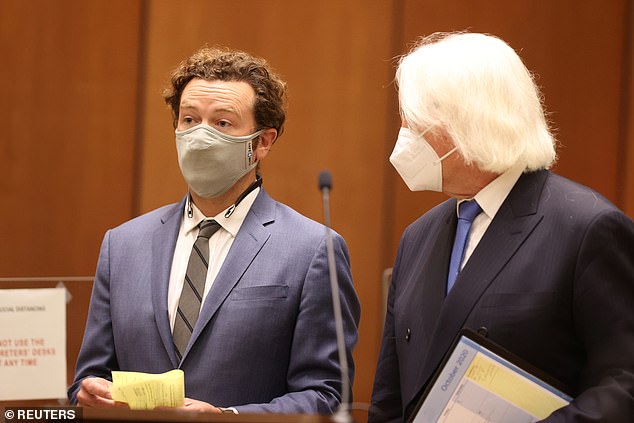 Masterson was seen in a blue suit and gray mask in the courtroom Friday where he stands accused of raping three women