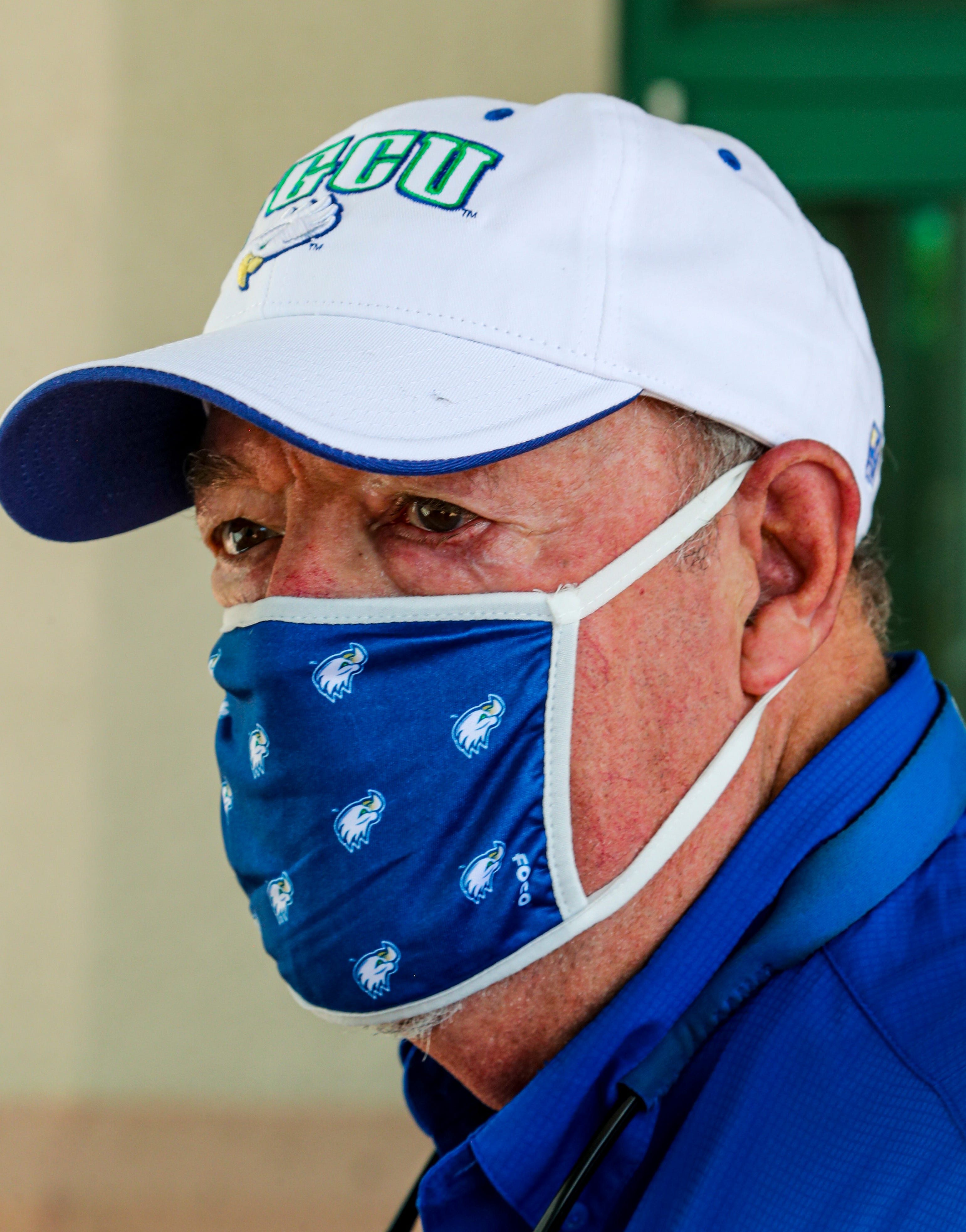 Mike Martin, president of FGCU, make sure his mask is on when interacting with anyone on campus. Fall semester at FGCU has begun with highlights on students moving in to campus dorms, the changes being seen on campus safety wise and the budget realities for what's to come.