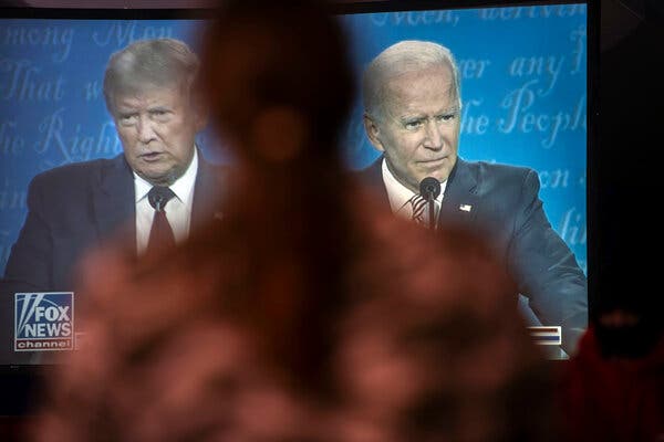 President Trump and Joseph R. Biden Jr. seen on a television Lititz, Pa., during their debate.
