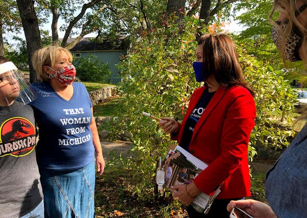 Gov. Gretchen Whitmer of Michigan, center right, during a campaign visit to Traverse City, Mich., on Friday, a day after police announced a foiled plot to kidnap the governor.