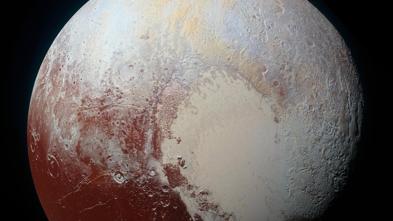 The Peaks of Pluto's Mountains Are White, But Not Snow-Covered : NPR