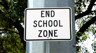 "End School Zone" sign outside an Austin ISD school. (Spectrum News 1)