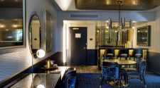 A comfortable living and retro bar area within the Circa End Suite at Circa on Friday, Dec. 18, ...