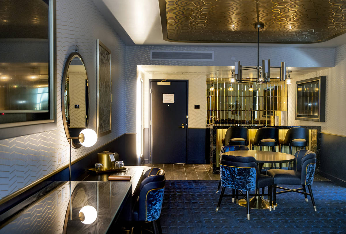 A comfortable living and retro bar area within the Circa End Suite at Circa on Friday, Dec. 18, ...