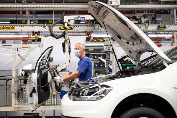 A Volkswagen assembly line in Wolfsburg, Germany. Volkswagen said it would have to adjust production at several factories because of a shortage of semiconductors.