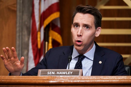Sen. Josh Hawley, R-Mo., asks questions during a Senate Homeland Security & Governmental Affairs Committee hearing to discuss election security and the 2020 election process on Wednesday, Dec. 16, 2020, on Capitol Hill in Washington, D.C..