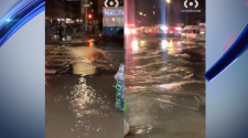 Water main break floods East Village street