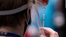 US Coronavirus: 'Healthy, young' Americans will likely get Covid-19 vaccine in mid- to late summer, expert says